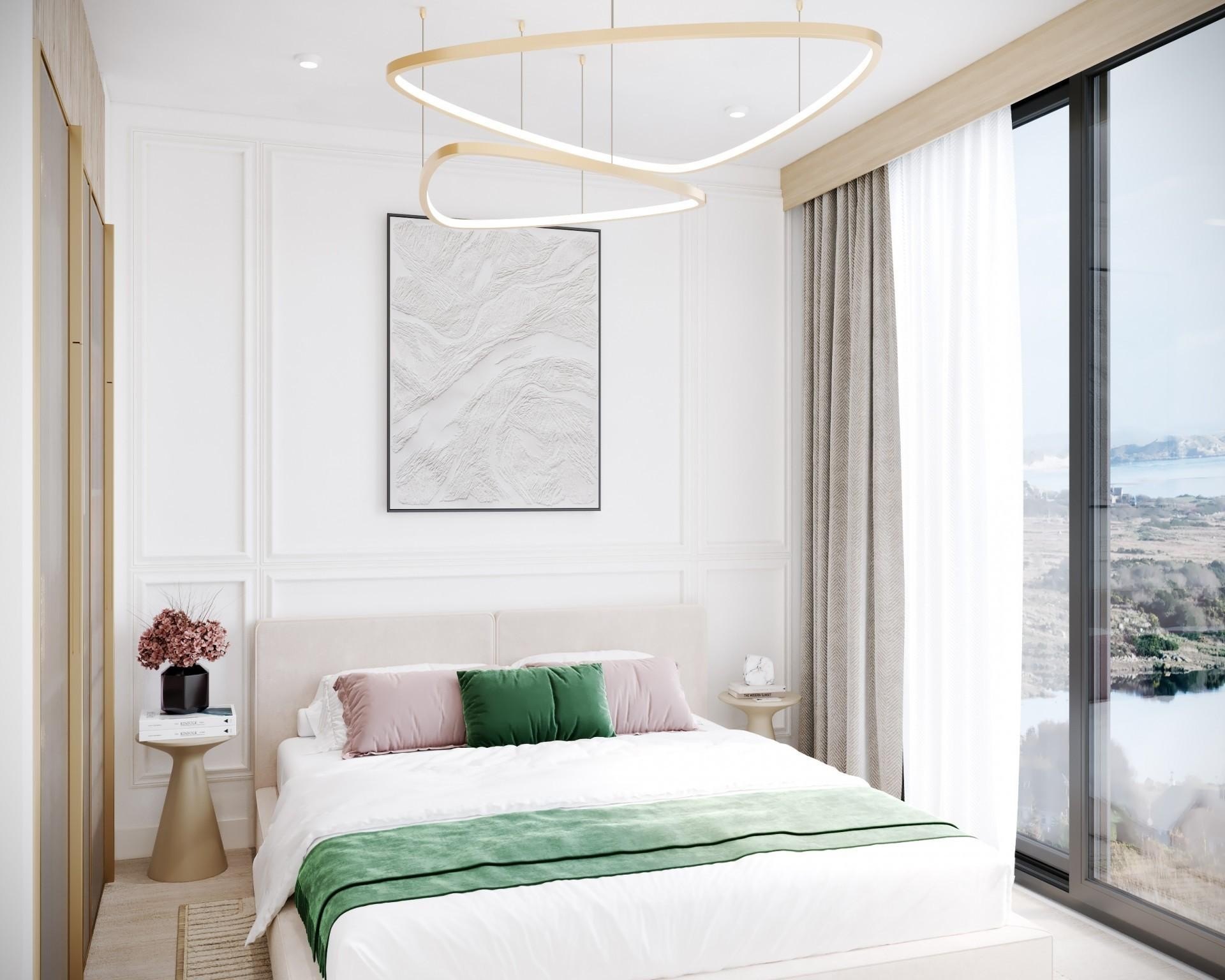 Rendering of a YOO Aruba bedroom whose tall window looks over dry scrub, apt for an island averaging about 18 inches of rain a year at its airport.