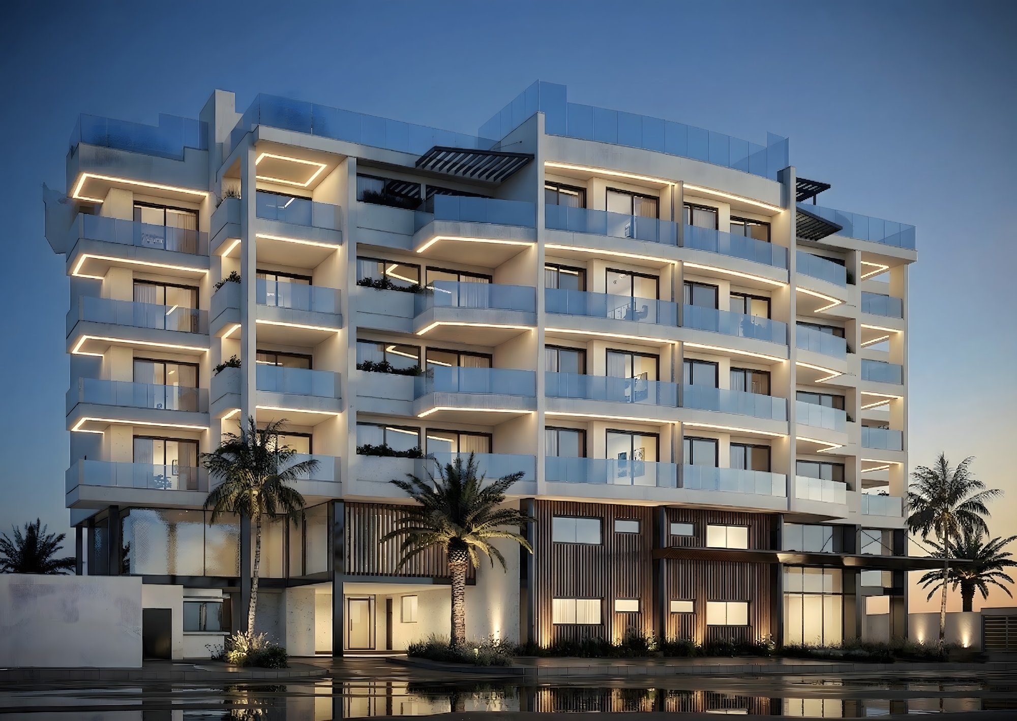 Rendering of the five-storey YOO Aruba building at dusk in Ponton, where residences are priced in US dollars from $443,000; not yet built, delivery Q4 2027
